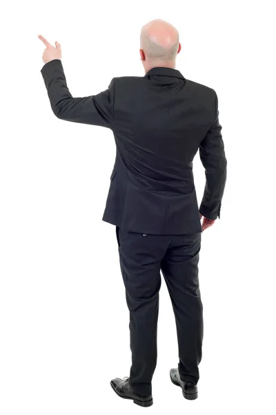 Empresário de corpo inteiro, apontando, em um fundo branco — Fotografia de Stock