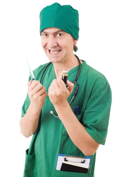 Mad doctor with a syringe isolated over white background — Stock Photo, Image