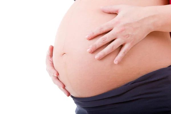 白い背景で妊娠中の女性のクローズ アップ — ストック写真