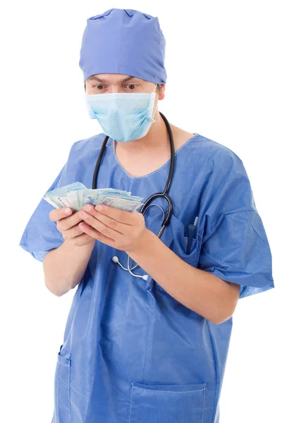 Szczęśliwy lekarz mężczyzna trzyma banknoty, na białym tle — Zdjęcie stockowe