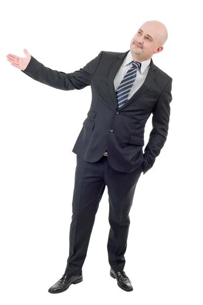 Geschäftsmann mit ausgestrecktem Arm in einer einladenden Geste, isoliert — Stockfoto