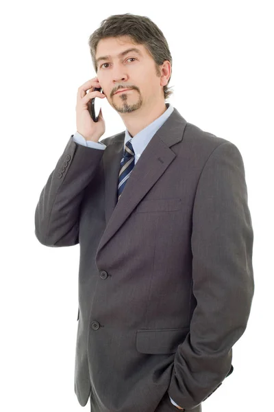 Молодий бізнесмен по телефону, ізольований — стокове фото