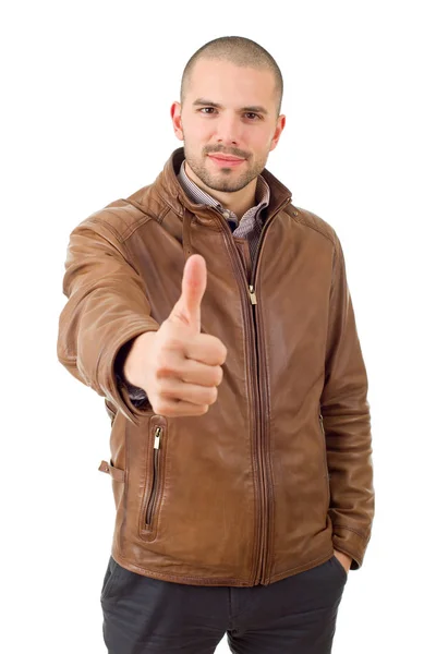 Young casual man going thumbs up, isolated on white — Stock Photo, Image