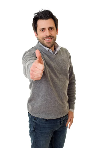 Casual jongeman gaan duimschroef opwaarts, geïsoleerd — Stockfoto