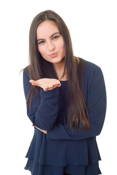 Young woman giving a kiss isolated on white background — Stock Photo, Image