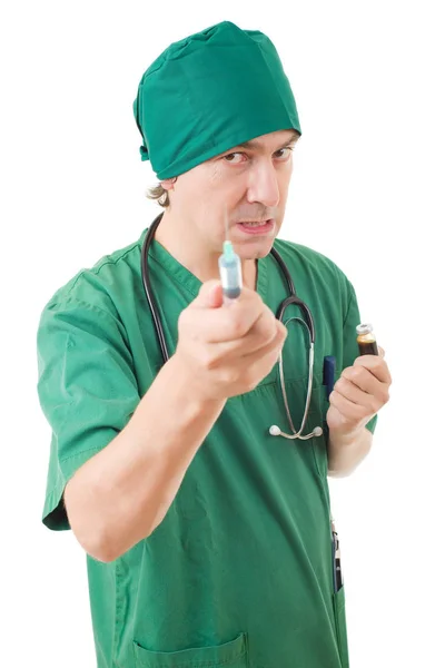 Mad doctor with a syringe isolated over white background — Stock Photo, Image