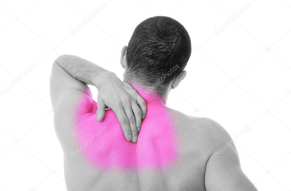 young man holding his back in pain, isolated