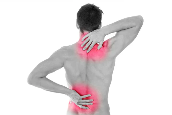 Egy fiatalember, hátán lévő fájdalom, elszigetelt hátsó nézet — Stock Fotó