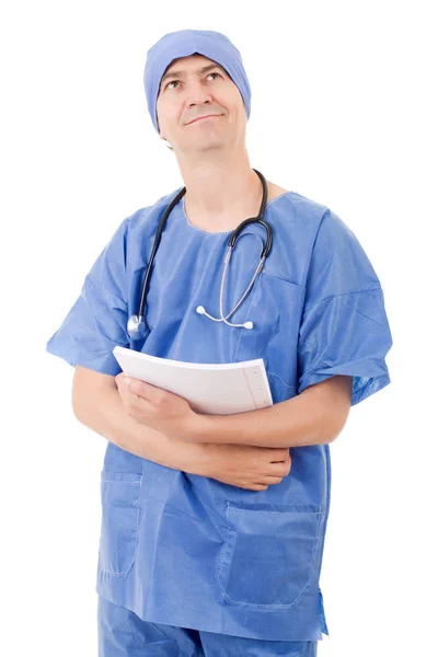 Smiling hospital doctor with his notes, isolated — Stock Photo, Image