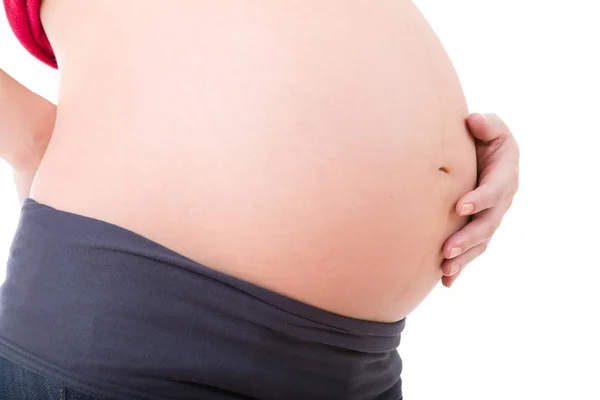Zbliżenie kobiety w ciąży w tle — Zdjęcie stockowe