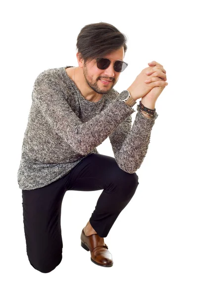 Man on knees, isolated over white background — Stock Photo, Image