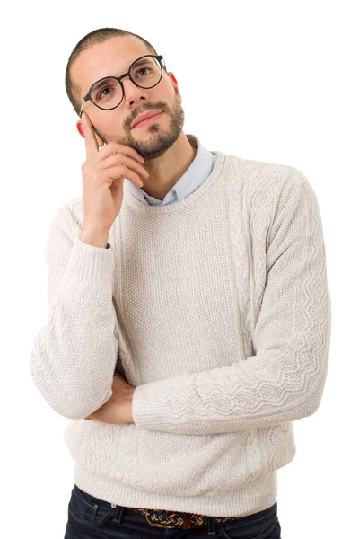 Casual jongeman denken, geïsoleerd — Stockfoto