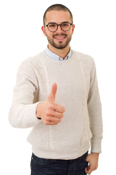 Young casual man going thumbs up, isolated — Stock Photo, Image