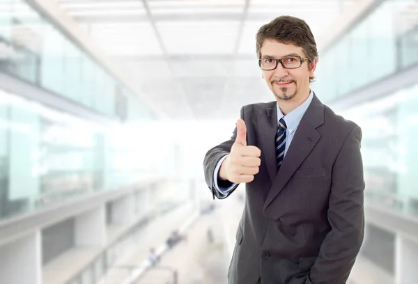 Young business man going thumb up, at the office — Stock Photo, Image