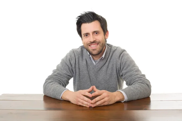 Happy casual man on a desk, isolated — Stock Photo, Image