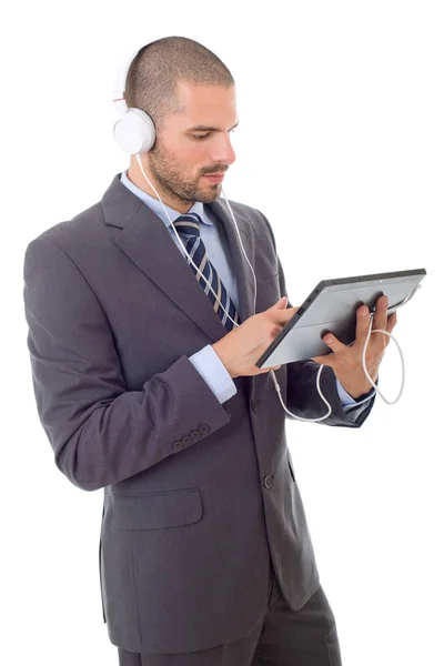 Jonge zakenman werkt met een tablet pc, geïsoleerd — Stockfoto