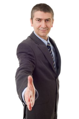 Takım elbiseli işadamı elini sıkmayı teklif ediyor.