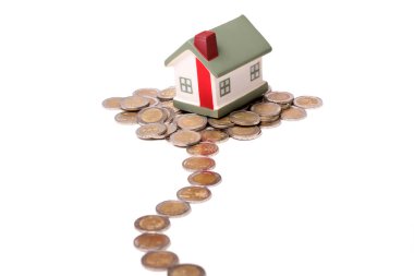 küçük ev ve madeni paralar