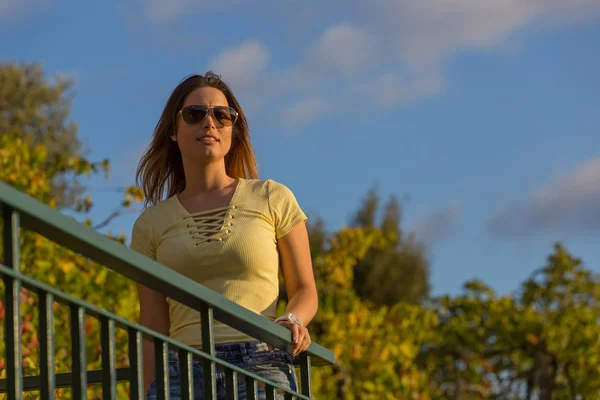 Beautiful casual woman enjoying the sunset, outdoor — Stock Photo, Image