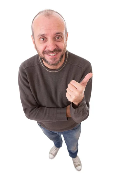 Jovem feliz indo polegares para cima, isolado em branco — Fotografia de Stock