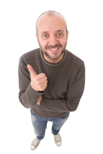 Jovem feliz indo polegares para cima, isolado em branco — Fotografia de Stock