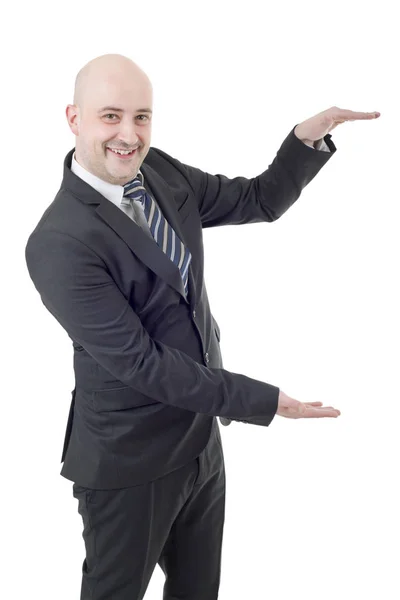 Homem de negócios feliz mostrando algo, isolado no branco — Fotografia de Stock