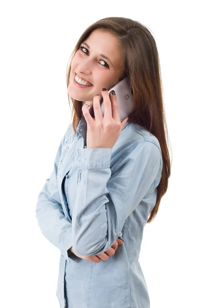 Jovem mulher feliz casual com um telefone, isolado — Fotografia de Stock