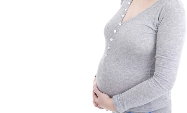 Closeup of pregnant woman at white background — Stock Photo, Image
