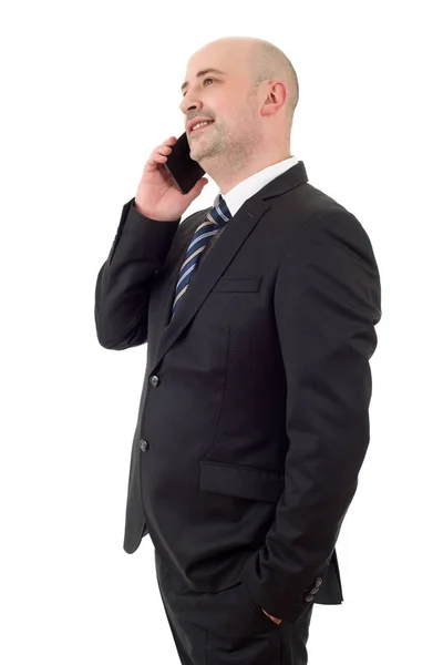 Счастливый бизнесмен по телефону, изолированный — стоковое фото