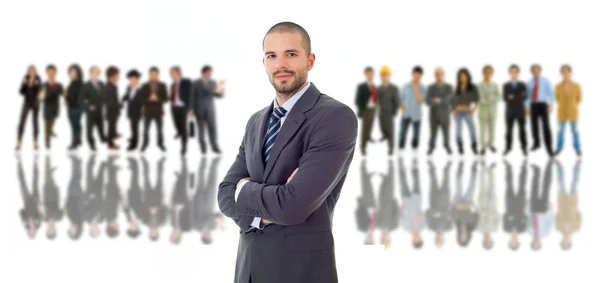 Business man in front of a group of people — Stock Photo, Image
