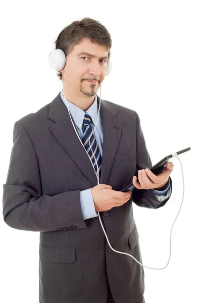 Biznesmen z tabletem i słuchawkami, izolowane — Zdjęcie stockowe
