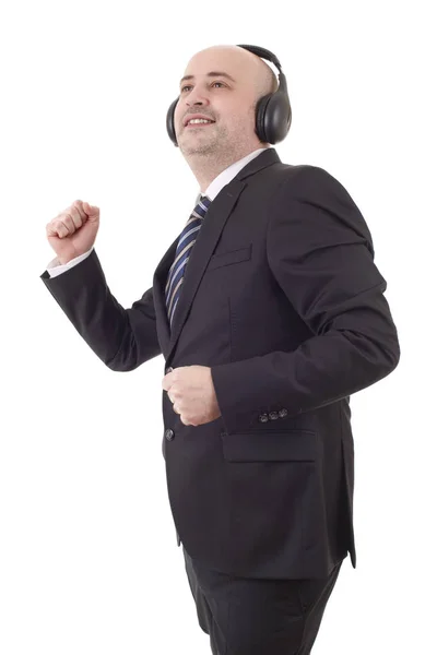 Muž se sluchátky s úsměvem a tanec — Stock fotografie