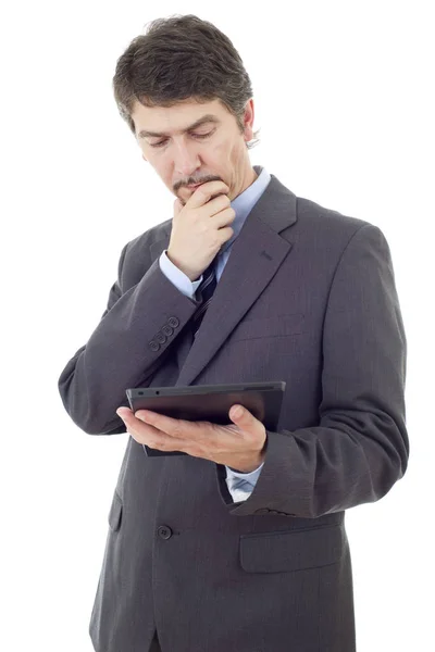 Hombre de negocios pensando con una tableta PC, aislado — Foto de Stock