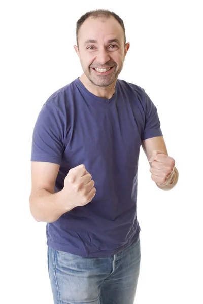 Happy young man winning with open arms, isolated — Stock Photo, Image