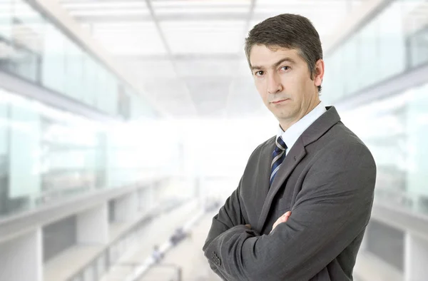 Young business man thinking, at the office — Stock Photo, Image