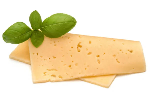 Fatias de queijo e folhas de manjericão isoladas — Fotografia de Stock