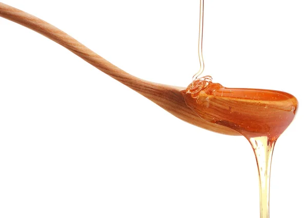 Honig tropft aus einem Holzwagen — Stockfoto