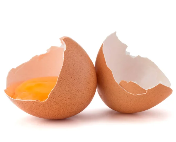 Broken egg  in eggshell half — Stock Photo, Image