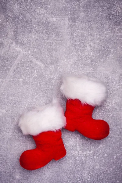 Noel tebrik kartı. Noel babalar Ayakkabı