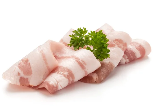 Sliced bacon and parsley leaves — Stock Photo, Image