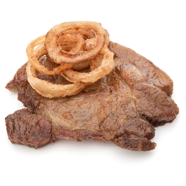 Мясо с ломтиками лука гарнир — стоковое фото