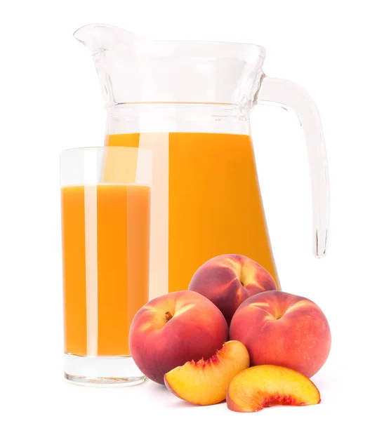 Suco de fruta pêssego em jarro de vidro — Fotografia de Stock