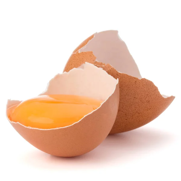 Broken egg  in eggshell half — Stock Photo, Image