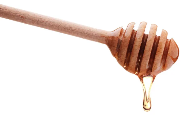 Honig tropft vom Löffel — Stockfoto