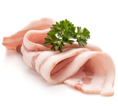 dilimlenmiş domuz pastırması ve maydanoz yaprakları 