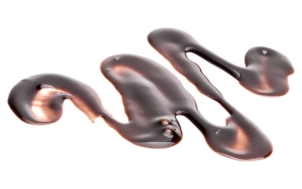 Xarope de chocolate em branco — Fotografia de Stock