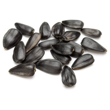 Beyaz arkaplanda izole edilmiş ayçiçeği tohumları