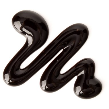 Çikolata şurubu izole üzerinde beyaz arka plan damla. Üstten Görünüm.