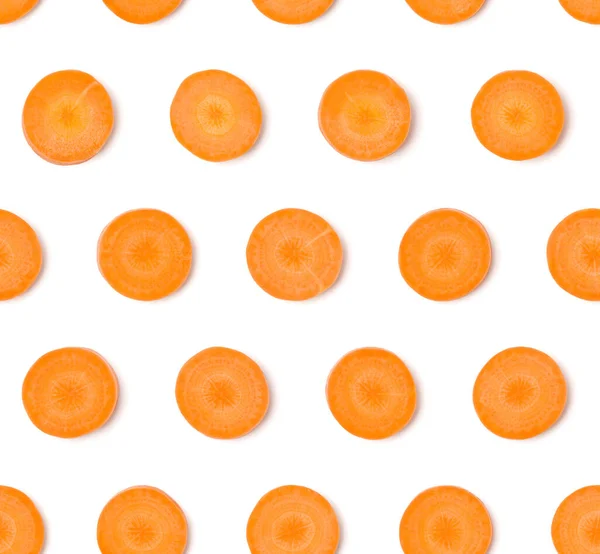 Kreativní rozložení z mrkvových plátků. Plocha, výhled shora. Veget — Stock fotografie