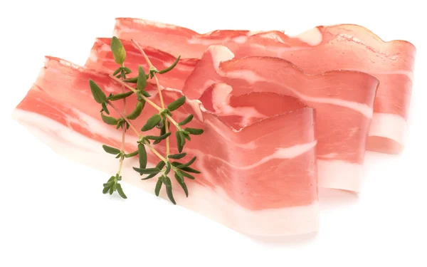 Italian prosciutto crudo or jamon. Raw ham. Isolated on white ba — Stock Photo, Image